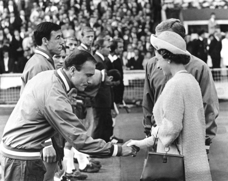 Queen Elizabeth II shaking hands with England footballer George Cohen, World Cup, Wembley, 1966.