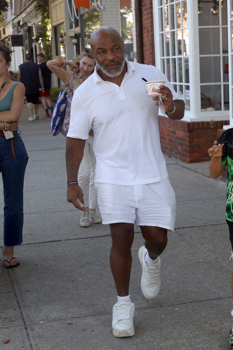 EXCLUSIVE: Mike Tyson Treats Himself To Eating Ice-Cream While Walking Around The Hamptons