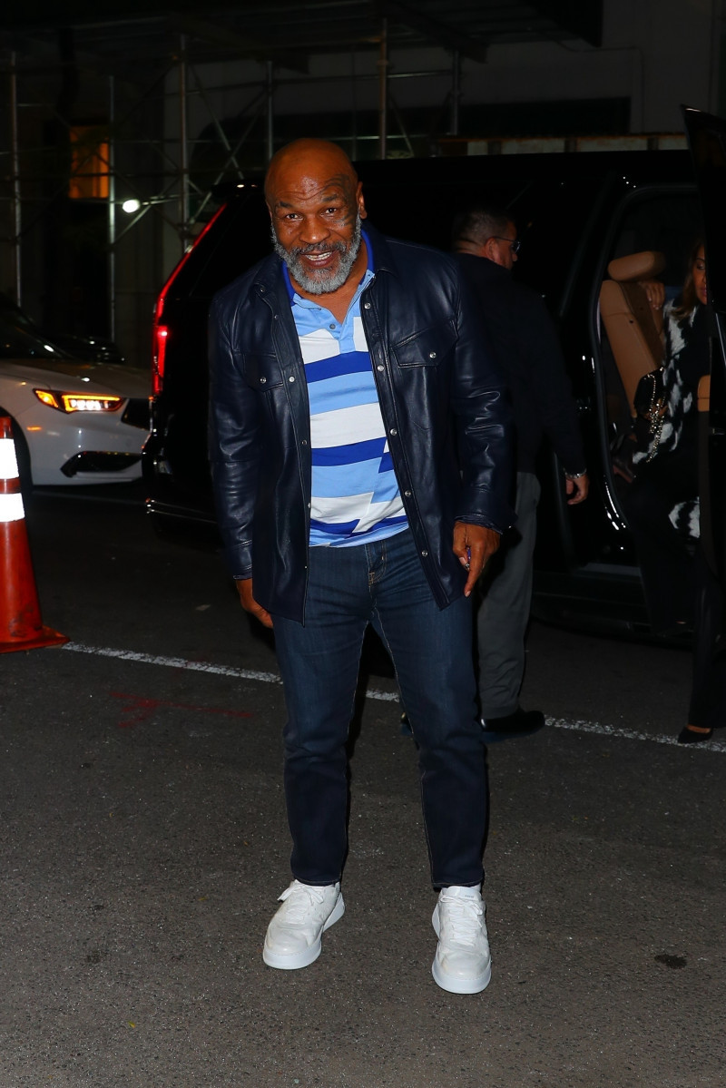 Mike Tyson is in good spirits as he heads out to dinner in NYC