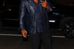 Mike Tyson chats it up on the phone call while arriving back at his downtown hotel in New York