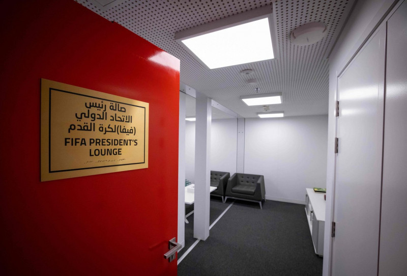 30 March 2022, Qatar, Doha: A sign reading "FIFA President's Lounge" is seen on the door to the lounge in a shipping container at Stadium 974 during a Fifa media tour. 974 colorfully arranged shipping containers were used to build the stadium. Doha will h