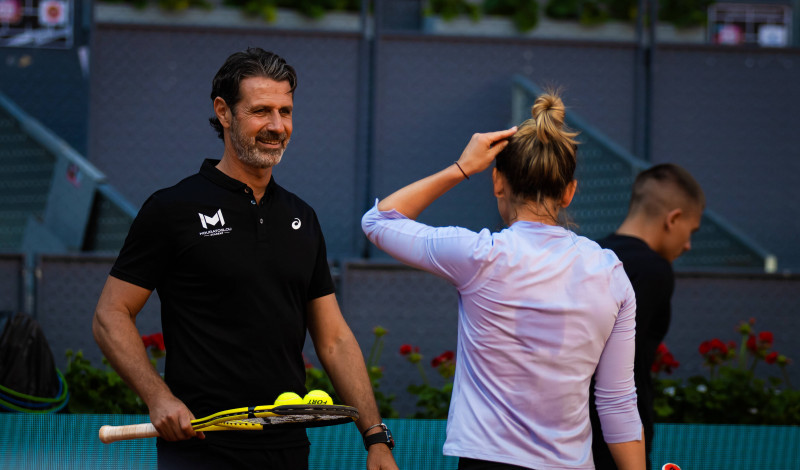 April 26, 2022, MADRID, MADRID, SPAIN: Simona Halep of Romania with coach Patrick Mouratoglou during practice ahead of t