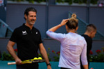 April 26, 2022, MADRID, MADRID, SPAIN: Simona Halep of Romania with coach Patrick Mouratoglou during practice ahead of t