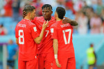 Breel Embolo of Switzerland, celebrates his goal with Remo Freuler and Ruben Vargas during the match between Switzerlan