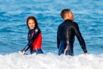 *PREMIUM-EXCLUSIVE* MUST CALL FOR PRICING BEFORE USAGE -Sexy Colombian and newly single Shakira grabs the attention of a few mystery male friends as she dons her wet suit and takes to the waters as she enjoys the summer holidays with the children in Ast