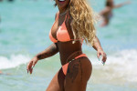 Rafaella Santos in a peach bikini at the beach in Miami