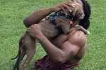 EXCLUSIVE: Strong Man Zion Clark An Inspirational Wrestler Plays With His Puppy At The Beach