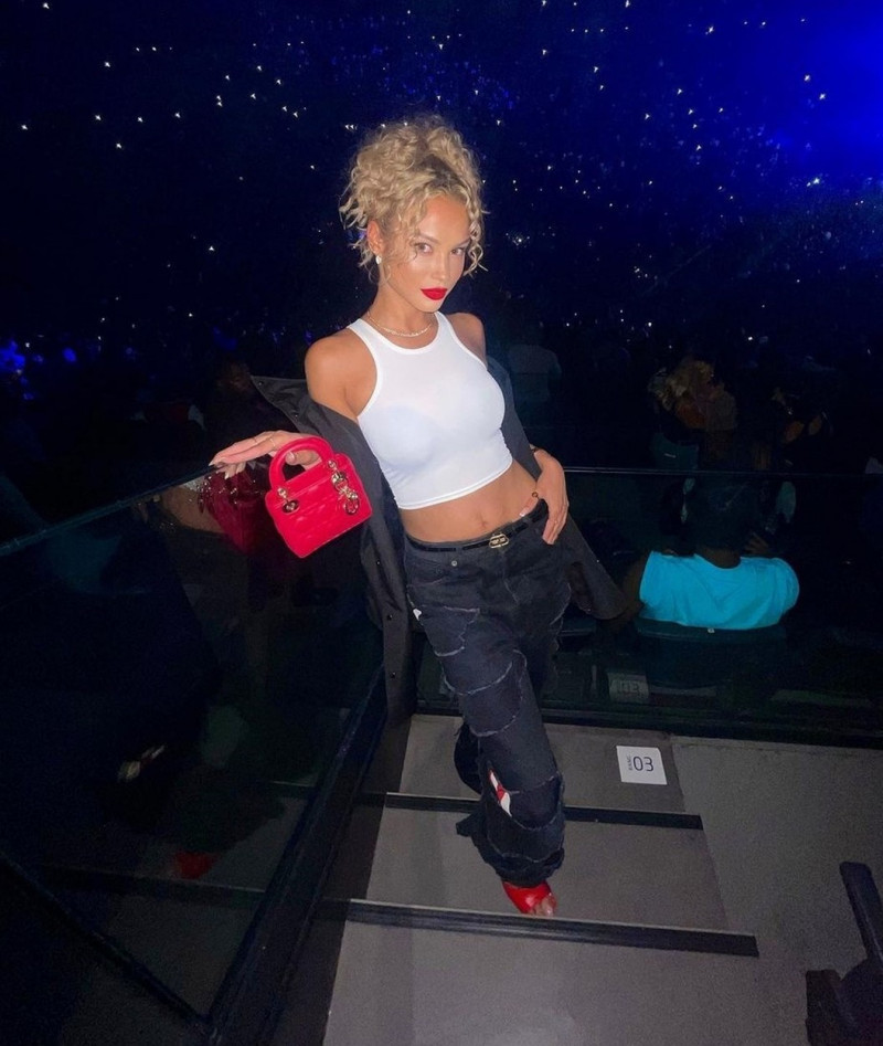 Kylian Mbappé's new girlfriend Rose Bertram poses up for a PrettyLittleThing shoot at a gig in Paris, France.