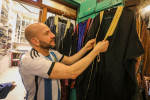 Football fans buy "Bisht" the traditional Arab cloak at a market in Doha, Qatar, Doha, Qatar - 21 Dec 2022