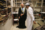 Football fans buy "Bisht" the traditional Arab cloak at a market in Doha, Qatar, Doha, Qatar - 21 Dec 2022