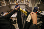 Football fans buy "Bisht" the traditional Arab cloak at a market in Doha, Qatar, Doha, Qatar - 21 Dec 2022