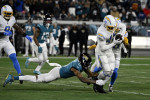 Jacksonville, USA. 14th Jan, 2023. Linebacker Drue Tranquill intercepts a pass in the first quarter as the Chargers compete against the Jaguars in the NFL Wildcard Playoff game at the TIAA Bank Field in Jacksonville, Florida on Saturday, January 14, 2023.