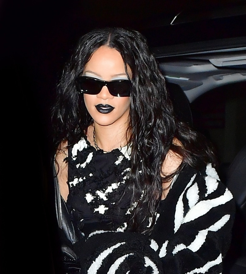 *EXCLUSIVE* Rihanna channels her inner Beetle Juice as she steps out for brother Rory's Halloween party in NYC