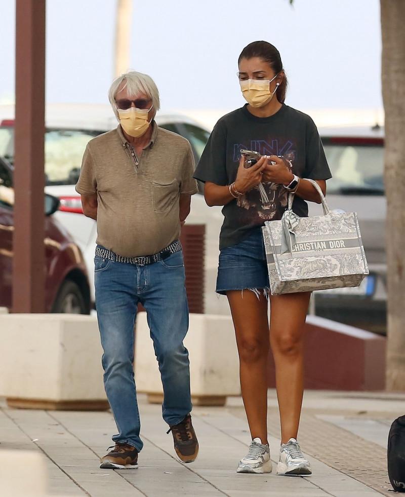 *EXCLUSIVE* Could the Former F1 supremos Flavio Briatore and Bernie Ecclestone be boat shopping?? as the pair take a stroll through Ibiza Marina and the Port Authority Building.