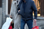 Exclusif: Bernie Ecclestone et sa femme Fabiana Flosi font du shopping a Gstaad.