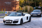 Milton Keynes,UK 2nd Dec 2021.Two Audi R8 supercars. Answering a last minute social media request from family, local car enthusiasts brought out their classic cars and supercars for the funeral of fellow car lover Roger Coulson who died recently aged 73.