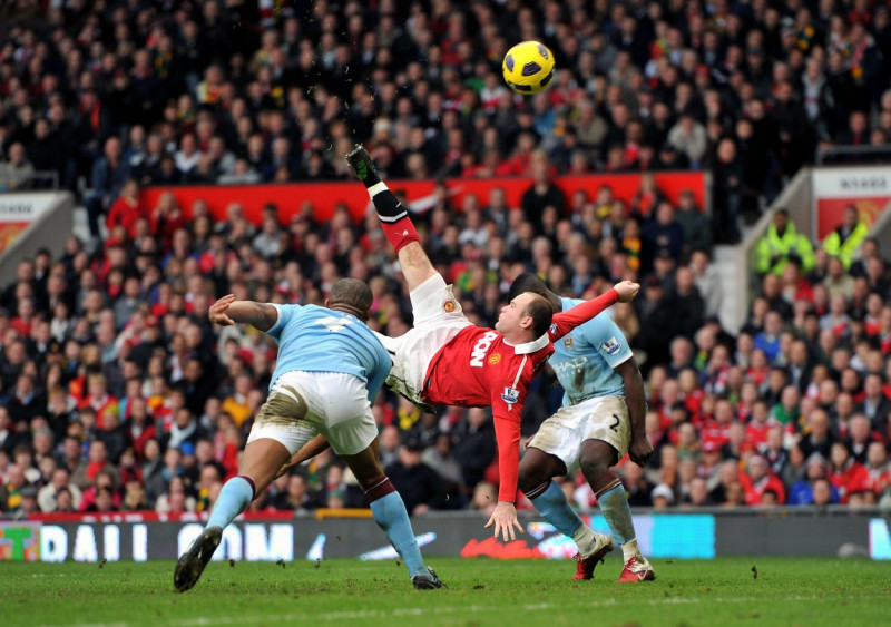 File photo dated 12-02-2011 of Manchester United's Wayne Rooney (centre). Just 12 minutes remained of a Manchester derby at Old Trafford when Nani's cross took a slight deflection off the back of Pablo Zabaleta. Wayne Rooney had to reposition himself near