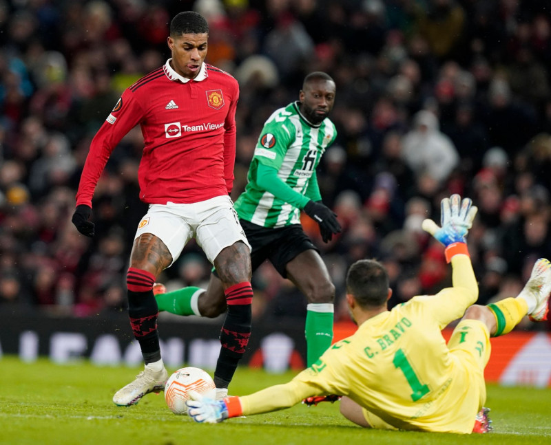 Manchester, England, 9th March 2023. Marcus Rashford of Manchester United, ManU has a shot saved by Claudio Bravo of Rea