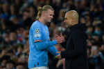 Erling Haaland of Man City and manager Pep Guardiola during the UEFA Champions League round of 16 2nd leg match between