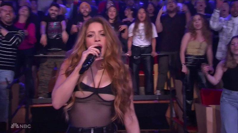 Shakira alludes to her split from ex Gerard Piqué before she dons racy leather chaps to perform breakup hit for the first time on The Tonight Show