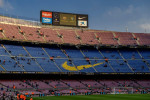 Panoramic view of the Camp Nou stadium at sunset, on a match day of the FC Barcelona first team (Barcelona, Catalonia, Spain)