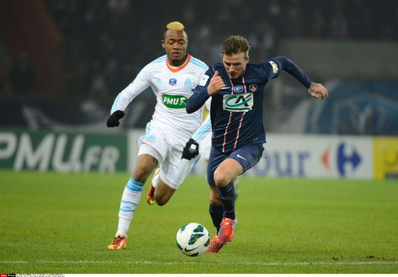 Paris: PSG's David Beckham and OM's Jordan Ayew duel
