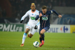 Paris: PSG's David Beckham and OM's Jordan Ayew duel