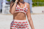Ivana Knoll wears a cherry outfit to the beach in Miami