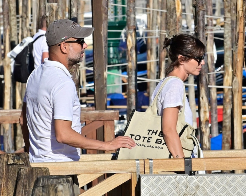 *EXCLUSIVE* WEB MUST CALL FOR PRICING - Manchester City coach Pep Guardiola takes some time out during the international break with his wife Cristina Serra as the pair take a sightseeing stroll through the romantic city of Venice.