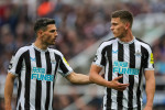 Premier League Newcastle United vs Leicester City Fabian SchĂ¤r 5 speaks to Sven Botman 4 of Newcastle United during the