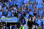 London, England, 3rd June 2023. Josep Guardiola manager of Manchester City celebrates the win in front of the City fans