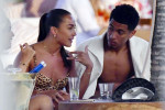 *EXCLUSIVE* WEB MUST CALL FOR PRICING - English footballer Jude Bellingham who is heavily linked with a move to Real Madrid is pictured chatting to some ladies while enjoying his summer vacation at SantAnna Beach Club in Mykonos.