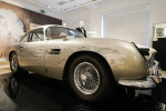 A silver birch Aston Martin DB5 stunt car, one of eight stunt replicas built for the film by Aston Martin and fitted with Q Branch modifications. This is the only DB5 stunt car from No Time To Die to be released for public sale and as the ultimate Bond co