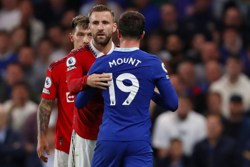 Luke Shaw of Manchester United pushes Mason Mount of Chelsea away from a confrontation with Lisandro Martinez of Manchester United - Chelsea v Manchester United, Premier League, Stamford Bridge, London, UK - 22nd October 2022Editorial Use Only - DataCo