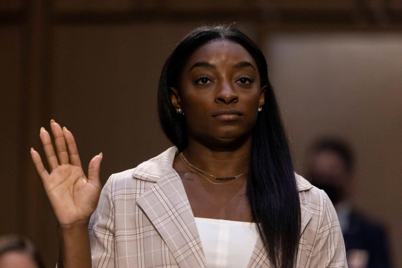 United States Olympic gymnast Simone Biles is sworn in during a Senate Judiciary hearing about the Inspector General's report on the FBI's handling of the Larry Nassar investigation on Capitol Hill, Wednesday, Sept. 15, 2021, in Washington. Nassar was cha