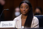 US Olympic gymnasts Simone Biles testifies during a Senate Judiciary hearing about the Inspector General's report on the FBI handling of the Larry Nassar investigation of sexual abuse of Olympic gymnasts, on Capitol Hill, September 15, 2021, in Washington