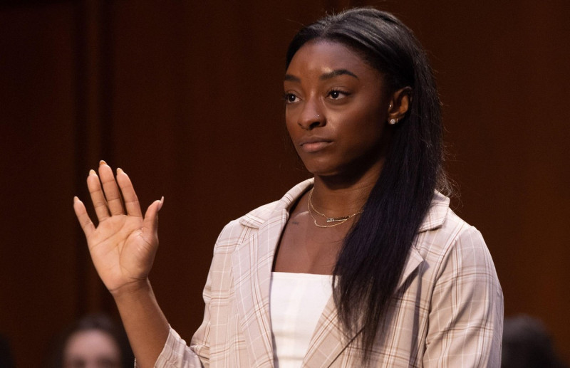US Olympic gymnasts Simone Biles is sworn in to testify during a Senate Judiciary hearing about the Inspector General's report on the FBI handling of the Larry Nassar investigation of sexual abuse of Olympic gymnasts, on Capitol Hill, September 15, 2021,