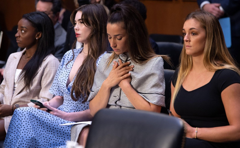 US Olympic gymnasts (L-R) Simone Biles, McKayla Maroney, Aly Raisman and Maggie Nichols, arrive to testify during a Senate Judiciary hearing about the Inspector General's report on the FBI handling of the Larry Nassar investigation of sexual abuse of Olym