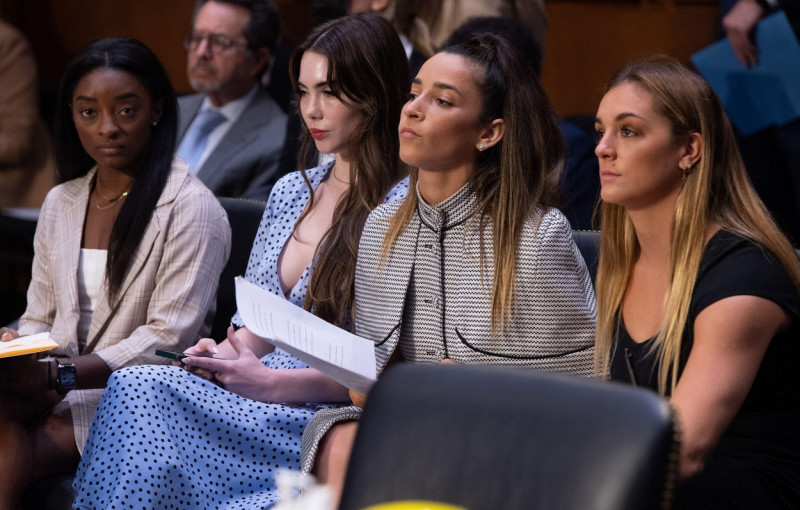 US Olympic gymnasts (L-R) Simone Biles, McKayla Maroney, Aly Raisman and Maggie Nichols, arrive to testify during a Senate Judiciary hearing about the Inspector General's report on the FBI handling of the Larry Nassar investigation of sexual abuse of Olym