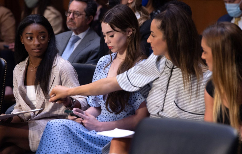 US Olympic gymnasts (L-R) Simone Biles, McKayla Maroney, Aly Raisman and Maggie Nichols, arrive to testify during a Senate Judiciary hearing about the Inspector General's report on the FBI handling of the Larry Nassar investigation of sexual abuse of Olym