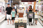 EXCLUSIVE: Lionel Messi and his wife Antonella start adjusting to life in America as they take their three sons to a Miami supermarket