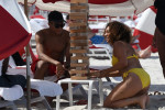 French football player Kylian Mbappe enjoys a game of Jenga on the beach with bikini clad girls in Miami