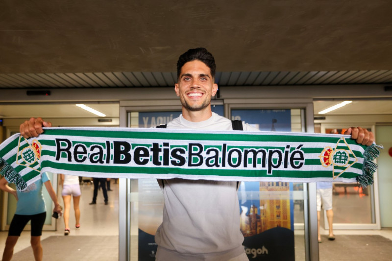 Marc Bartra and Chadi Riad arrives at Seville