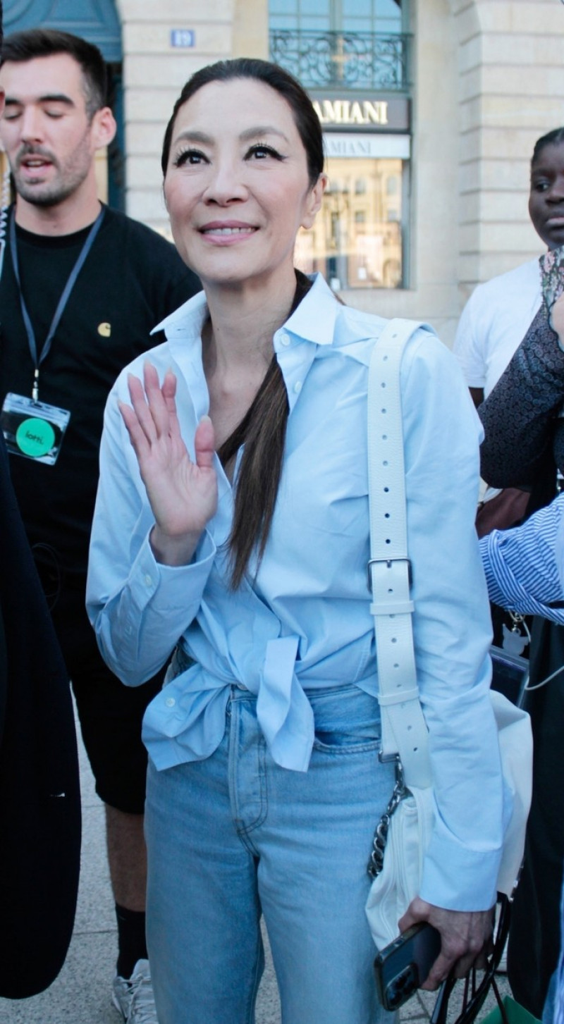 *EXCLUSIVE* Actress Michelle Yeoh meeting fans as she steps out of the Hôtel d'Évreux in Paris