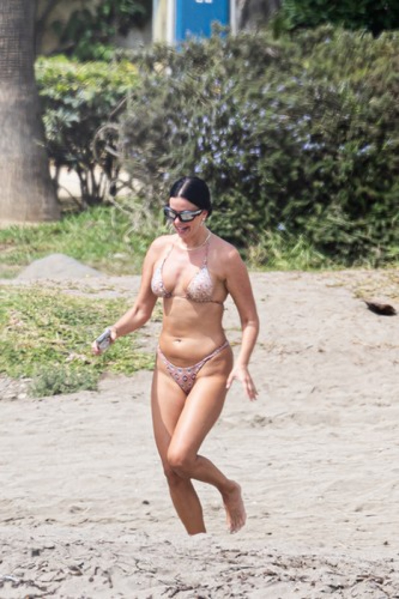 EXCLUSIVE: World Cup's Sexiest Fan Ivana Knoll Enjoys A Day At The Beach In Marbella
