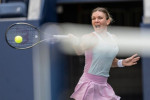 New York, NY - August 29, 2022: Simona Halep returns ball during 1st round of US Open Tennis Championship against Daria Snigur of Ukraine at Billie Jean King National Tennis Center