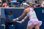 New York, NY - August 29, 2022: Simona Halep of Romania serves during 1st round of US Open Tennis Championship against Daria Snigur of Ukraine at Billie Jean King National Tennis Center