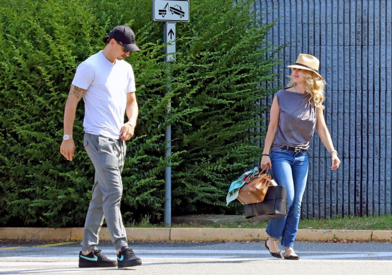 *EXCLUSIVE* After announcing his retirement from the game, the former Swedish football player Zlatan Ibrahimovic is seen with wife Helena Seger at the Milan's private airport.