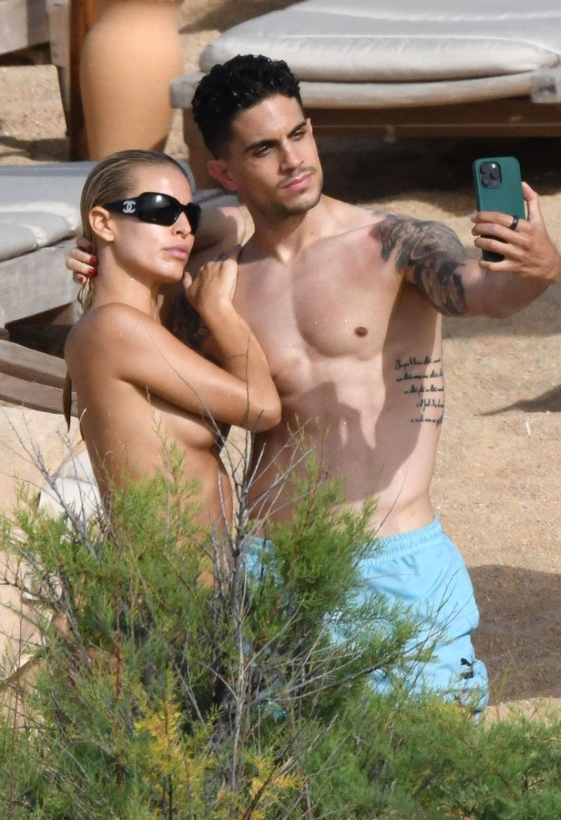 *EXCLUSIVE* Spanish footballer Marc Bartra and his girlfriend Influencer Jessica Goicoechea pictured relaxing while enjoying a holiday in Porto Cervo.