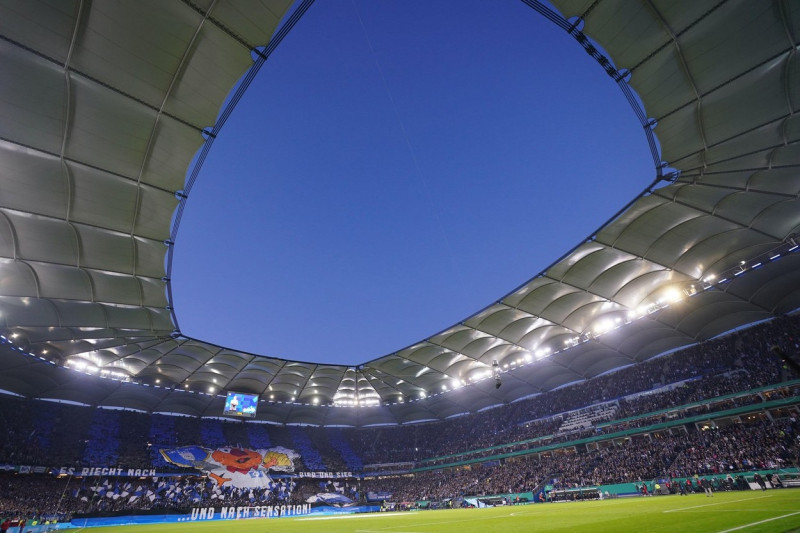 Hamburg, Germany. 19th Apr, 2022. Soccer: DFB Cup, Hamburger SV - SC Freiburg, Semifinal, Volksparkstadion. A view into the fully occupied stadium . IMPORTANT NOTE: In accordance with the requirements of the DFL Deutsche Fuball Liga and the DFB Deutscher